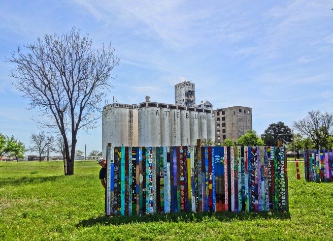 Andrew standing at fence